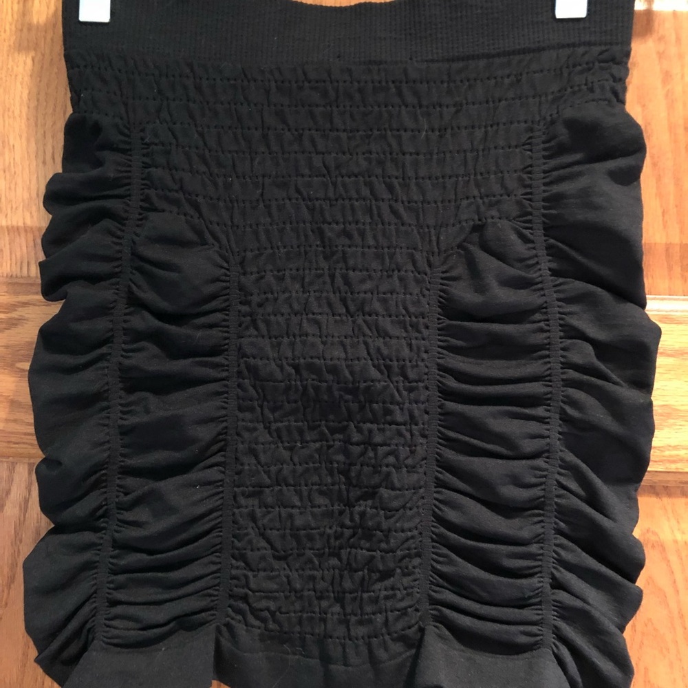 NWOT Bebe size M/L black mini skirt